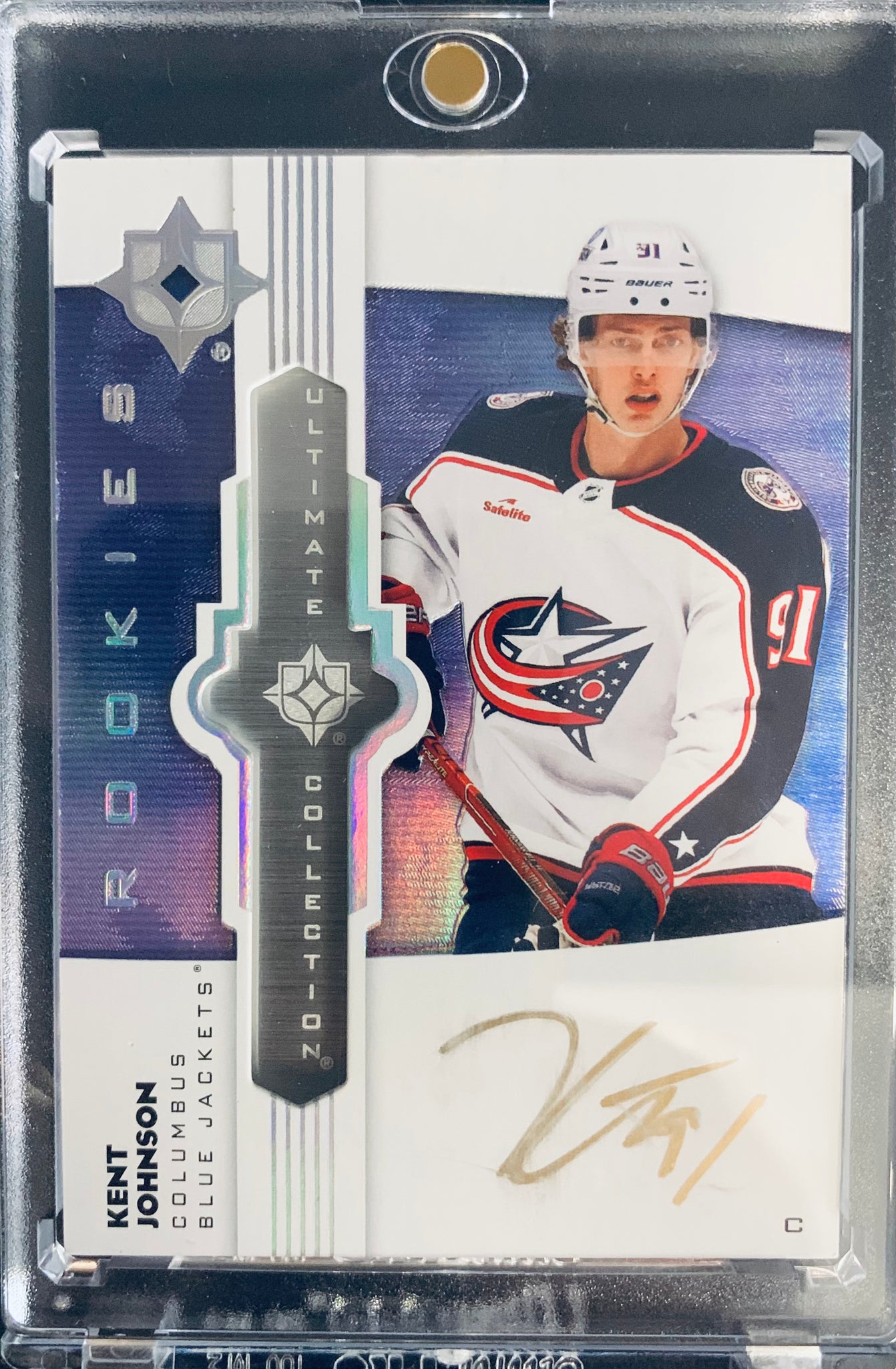 2022-23 UD ULTIMATE HOCKEY #UE-KJ COLUMBUS BLUE JACKETS - KENT JOHNSON ULTIMATE ROOKIES AUTOGRAPH GOLD INK