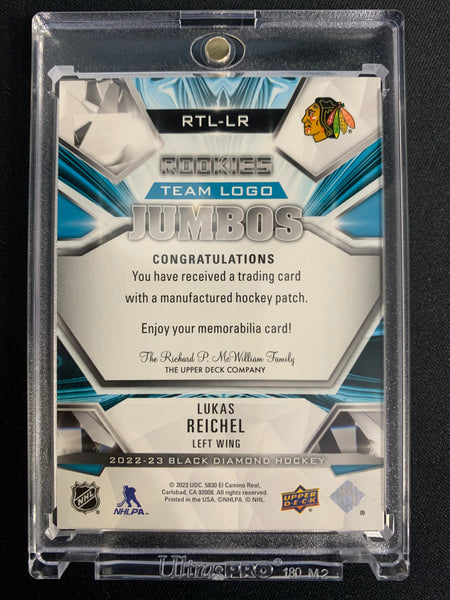 2022-23 UD BLACK DIAMOND HOCKEY #RTL-LR CHICAGO BLACKHAWKS - LUKAS REICHEL ROOKIE TEAM LOGO JUMBOS