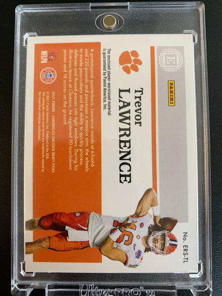 2021 PANINI CHRONICLES DRAFT PICKS FOOTBALL #ERS-TL JACKSONVILLE JAGUARS - TREVOR LAWRENCE ENCASED SUBSTANTIAL ROOKIE SWATCHES ROOKIE CARD