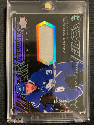 2020-21 UPPER DECK BLACK HOCKEY #OJ-AM TORONTO MAPLE LEAFS - AUSTON MATTHEWS BLACK OBSIDIAN JERSEY NUMBERED 157/249