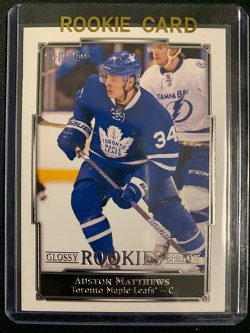 2016-17 UPPER DECK SERIES 2 HOCKEY #R-1 TORONTO MAPLE LEAFS - AUSTON MATTHEWS OPC GLOSSY ROOKIE CARD