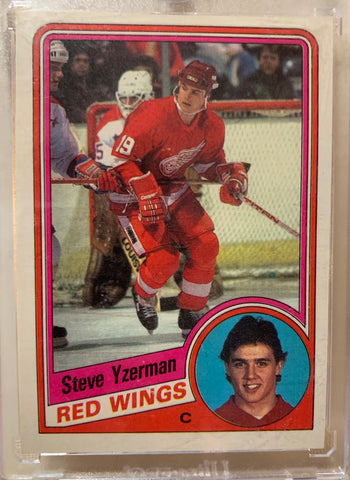 1984-85 O-PEE-CHEE HOCKEY #67 DETROIT RED WINGS - STEVE YZERMAN ROOKIE CARD RAW